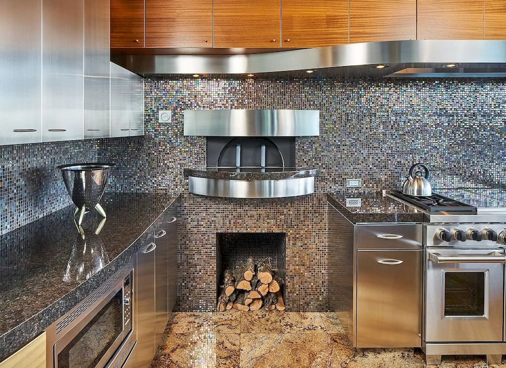 The Architecturally Significant Contemporary House in Oregon offers the perfect balance between function & form now available for sale. This home is located at 9912 NW Wind Ridge Dr, Portland, Oregon