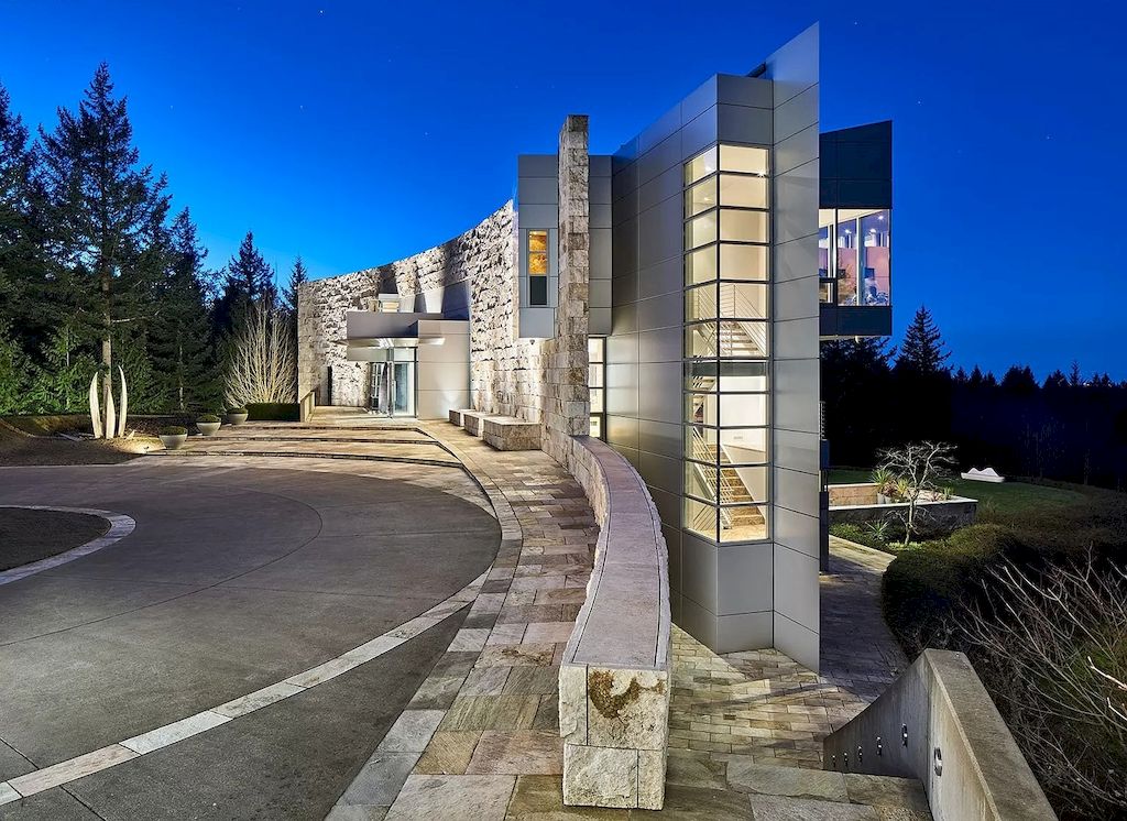 The Architecturally Significant Contemporary House in Oregon offers the perfect balance between function & form now available for sale. This home is located at 9912 NW Wind Ridge Dr, Portland, Oregon