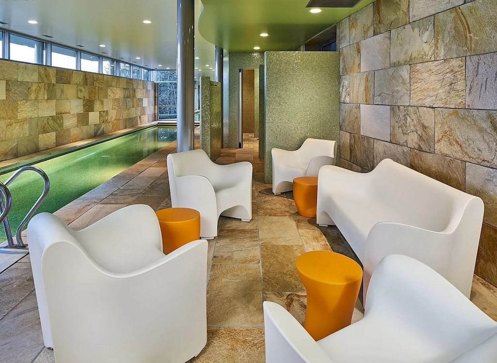 The Architecturally Significant Contemporary House in Oregon offers the perfect balance between function & form now available for sale. This home is located at 9912 NW Wind Ridge Dr, Portland, Oregon