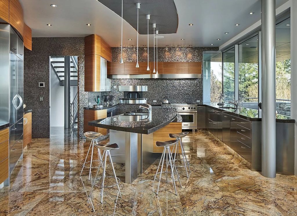 The Architecturally Significant Contemporary House in Oregon offers the perfect balance between function & form now available for sale. This home is located at 9912 NW Wind Ridge Dr, Portland, Oregon