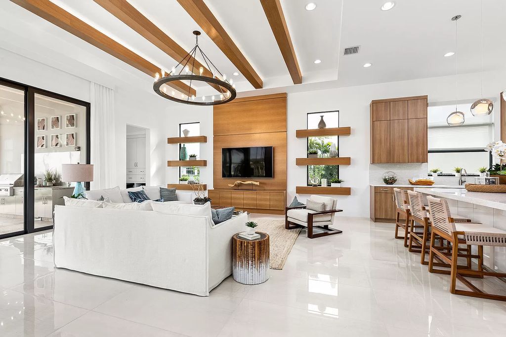 The Boca Raton Home is a Contemporary estate on a magnificent point pie lot with spectacular lake view in Boca Bridges now available for sale. This home located at 17230 Brulee Breeze Way, Boca Raton, Florida