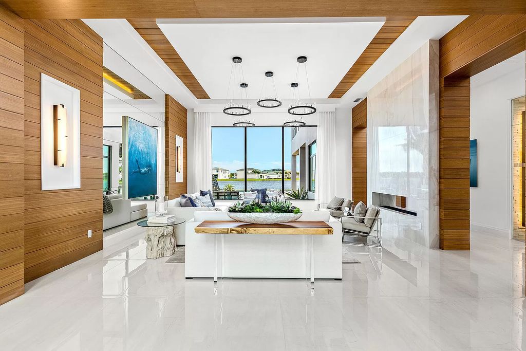 The Boca Raton Home is a Contemporary estate on a magnificent point pie lot with spectacular lake view in Boca Bridges now available for sale. This home located at 17230 Brulee Breeze Way, Boca Raton, Florida