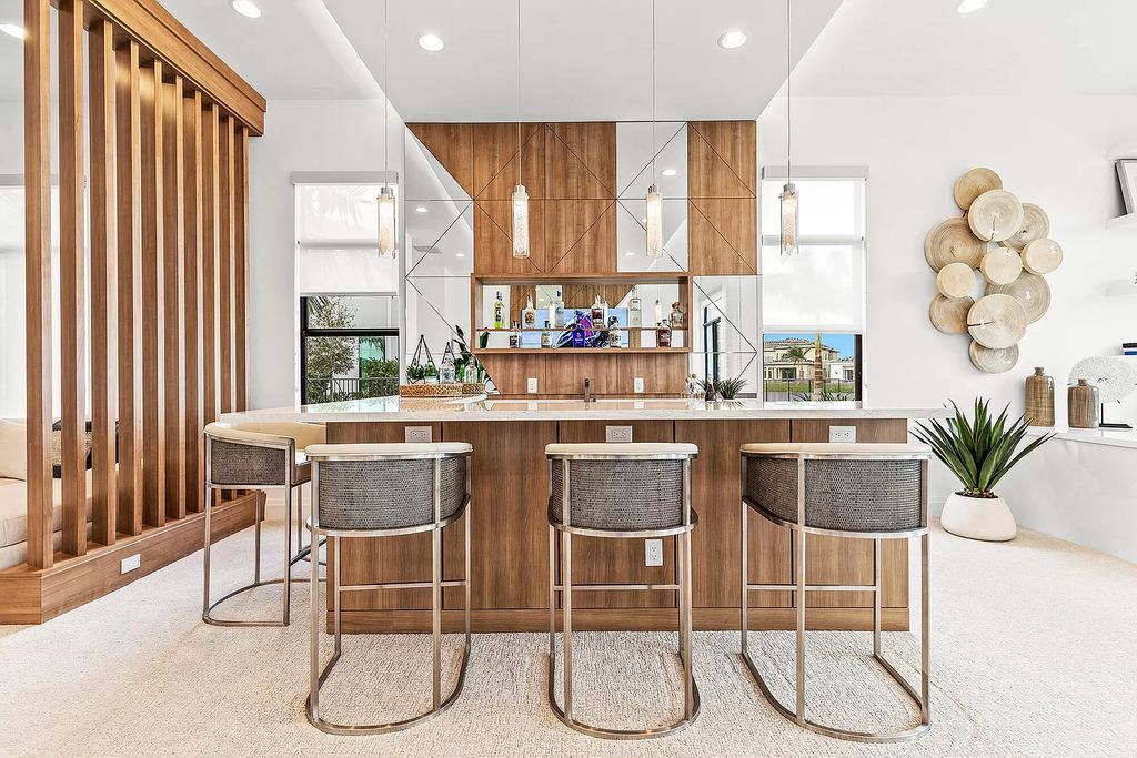 The Boca Raton Home is a Contemporary estate on a magnificent point pie lot with spectacular lake view in Boca Bridges now available for sale. This home located at 17230 Brulee Breeze Way, Boca Raton, Florida