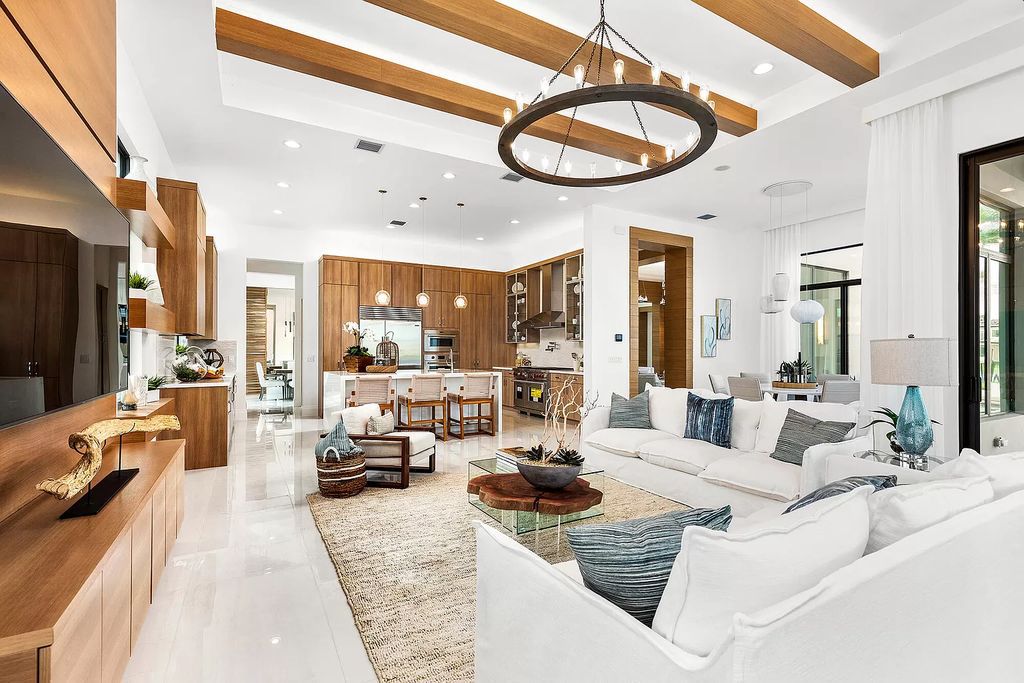 The Boca Raton Home is a Contemporary estate on a magnificent point pie lot with spectacular lake view in Boca Bridges now available for sale. This home located at 17230 Brulee Breeze Way, Boca Raton, Florida