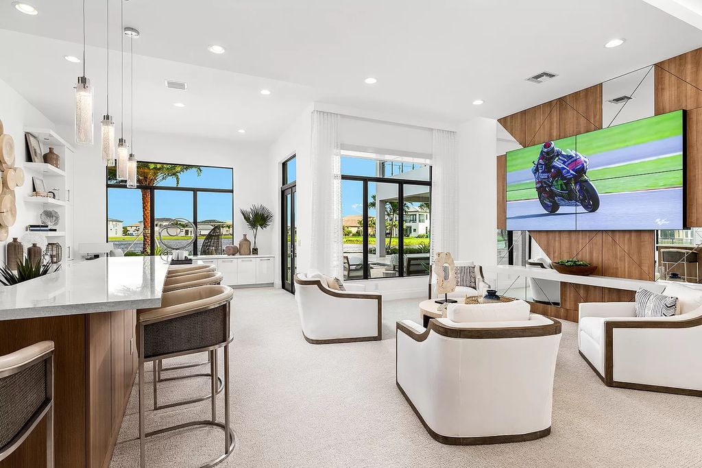 The Boca Raton Home is a Contemporary estate on a magnificent point pie lot with spectacular lake view in Boca Bridges now available for sale. This home located at 17230 Brulee Breeze Way, Boca Raton, Florida