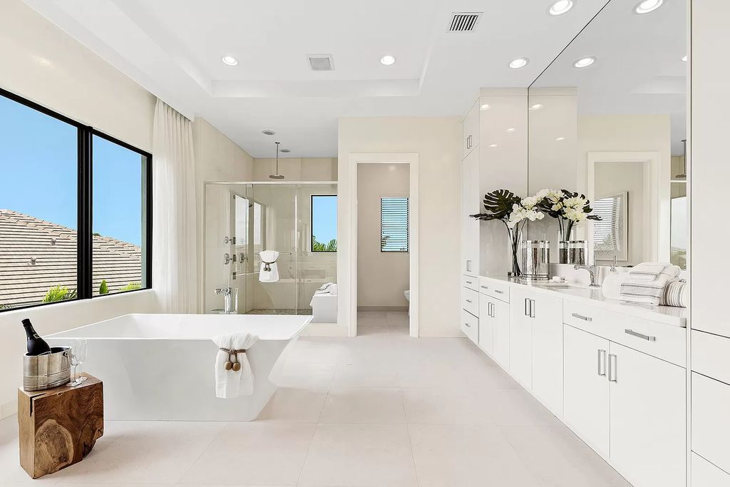 The Boca Raton Home is a Contemporary estate on a magnificent point pie lot with spectacular lake view in Boca Bridges now available for sale. This home located at 17230 Brulee Breeze Way, Boca Raton, Florida