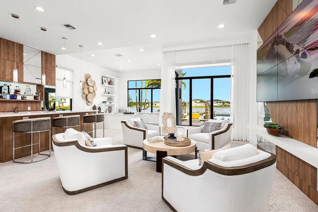 The Boca Raton Home is a Contemporary estate on a magnificent point pie lot with spectacular lake view in Boca Bridges now available for sale. This home located at 17230 Brulee Breeze Way, Boca Raton, Florida