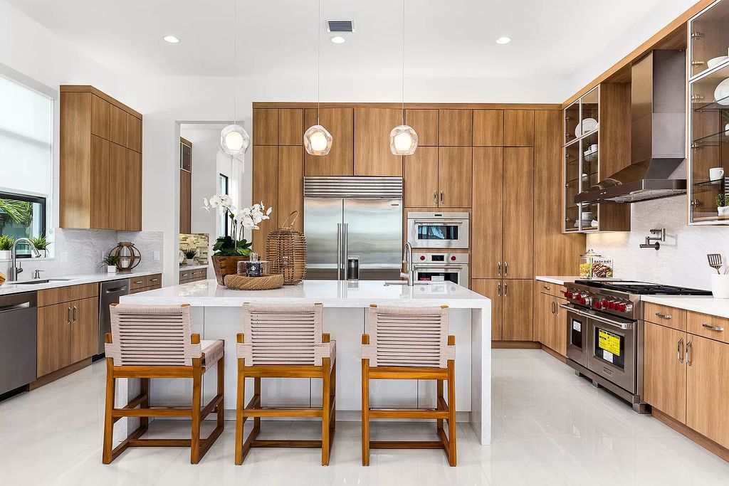 The Boca Raton Home is a Contemporary estate on a magnificent point pie lot with spectacular lake view in Boca Bridges now available for sale. This home located at 17230 Brulee Breeze Way, Boca Raton, Florida
