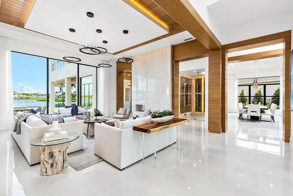 The Boca Raton Home is a Contemporary estate on a magnificent point pie lot with spectacular lake view in Boca Bridges now available for sale. This home located at 17230 Brulee Breeze Way, Boca Raton, Florida