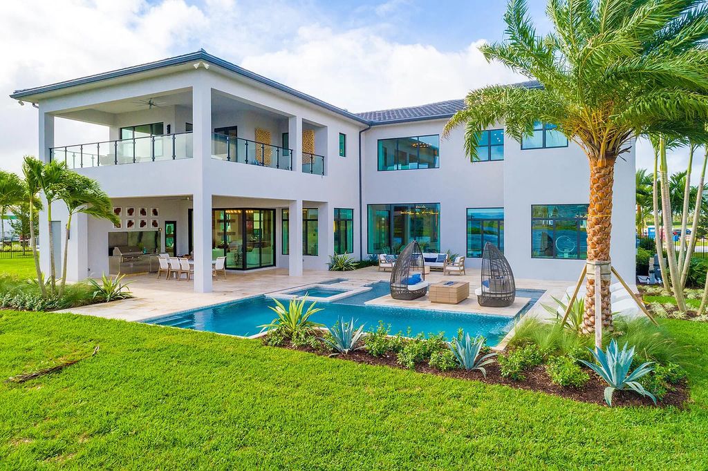 The Boca Raton Home is a Contemporary estate on a magnificent point pie lot with spectacular lake view in Boca Bridges now available for sale. This home located at 17230 Brulee Breeze Way, Boca Raton, Florida