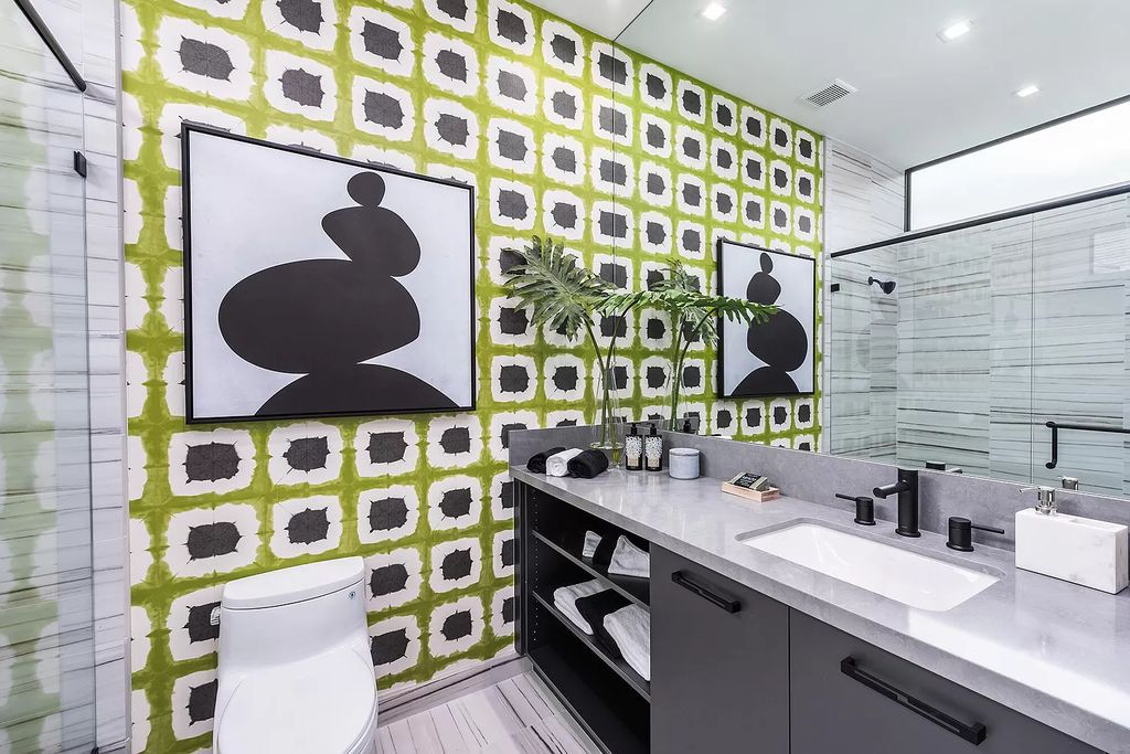 The Home in Boca Raton is a modern one story estate features a fabulous entertaining backyard with upgraded summer kitchen now available for sale. This home located at 17242 Brulee Breeze Way, Boca Raton, Florida