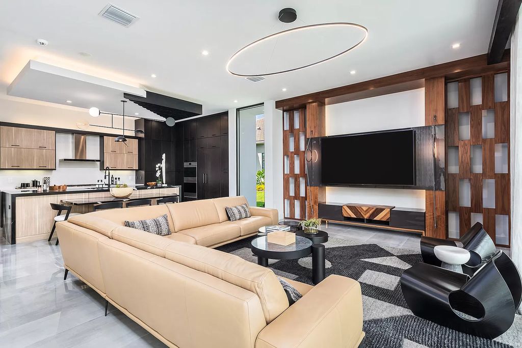 The Home in Boca Raton is a modern one story estate features a fabulous entertaining backyard with upgraded summer kitchen now available for sale. This home located at 17242 Brulee Breeze Way, Boca Raton, Florida