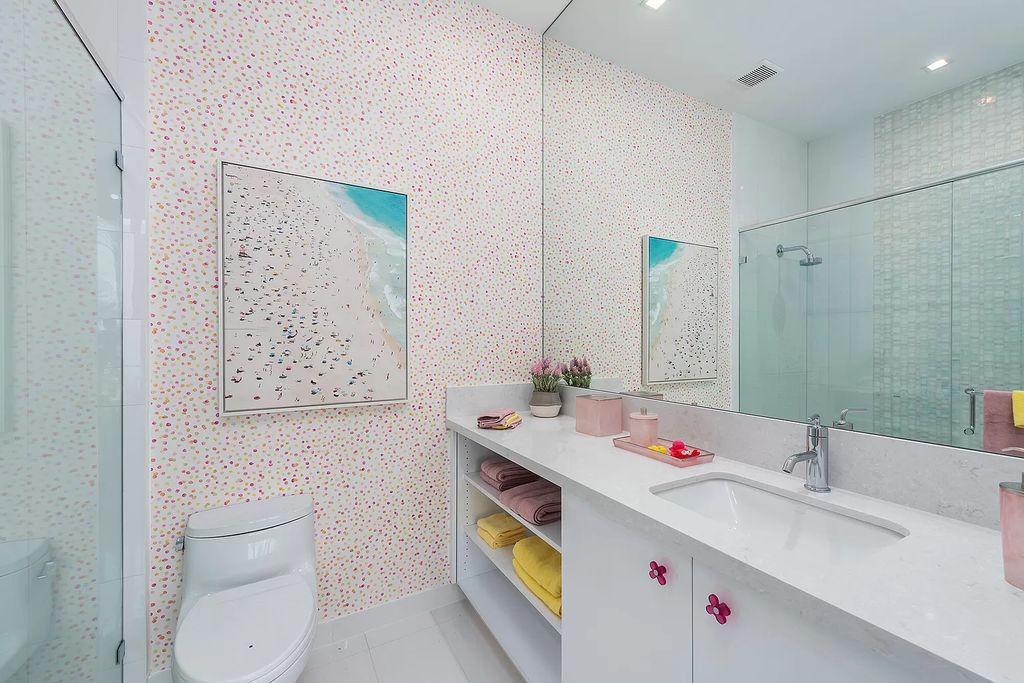 The Home in Boca Raton is a modern one story estate features a fabulous entertaining backyard with upgraded summer kitchen now available for sale. This home located at 17242 Brulee Breeze Way, Boca Raton, Florida