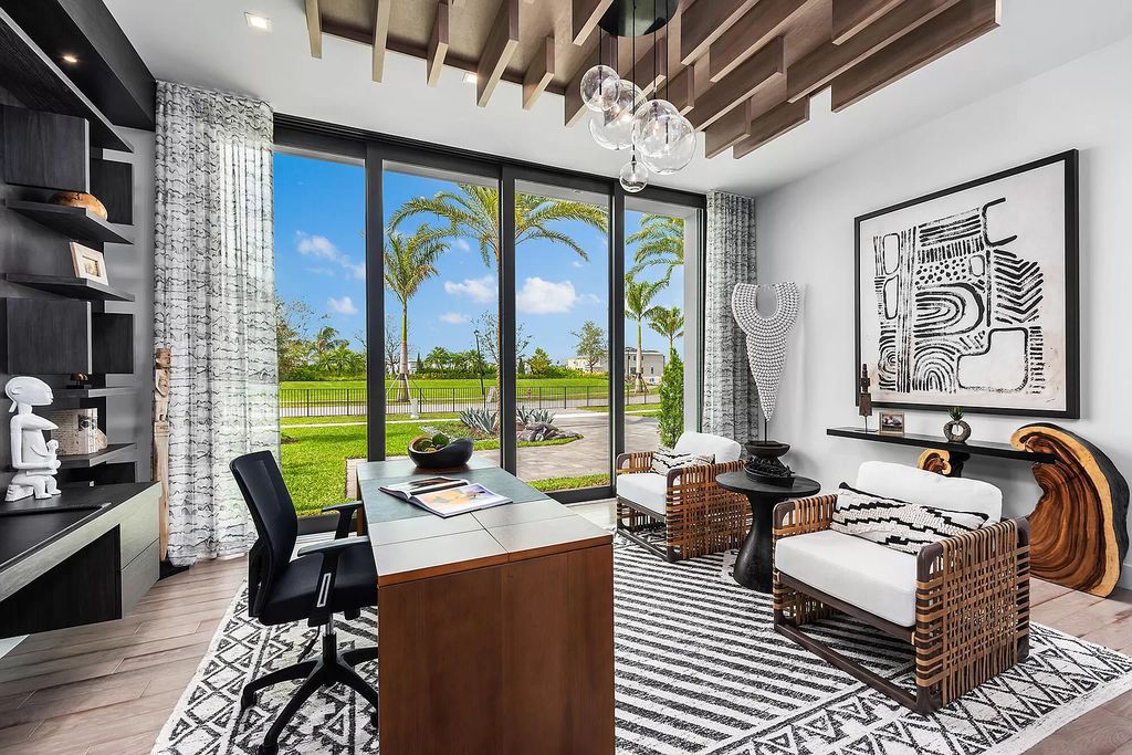 The Home in Boca Raton is a modern one story estate features a fabulous entertaining backyard with upgraded summer kitchen now available for sale. This home located at 17242 Brulee Breeze Way, Boca Raton, Florida