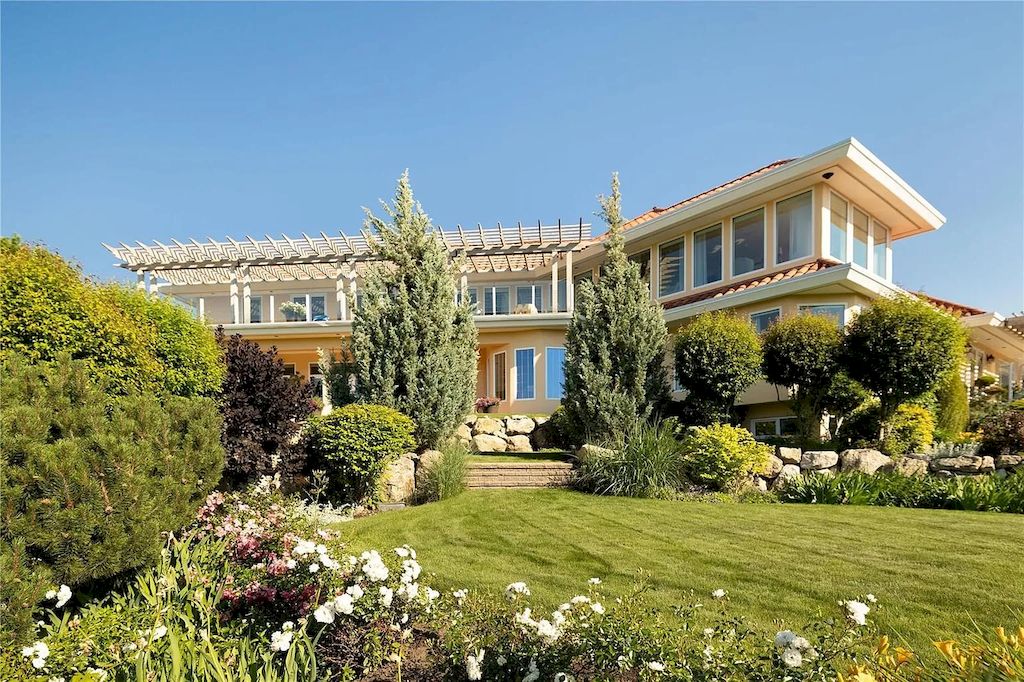 The Charming Italian Style Villa in Kelowna is a private country estate now available for sale. This home is located at 3240 Pooley Rd, Kelowna, BC V1W 4G7, Canada