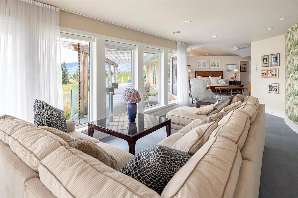 The Charming Italian Style Villa in Kelowna is a private country estate now available for sale. This home is located at 3240 Pooley Rd, Kelowna, BC V1W 4G7, Canada