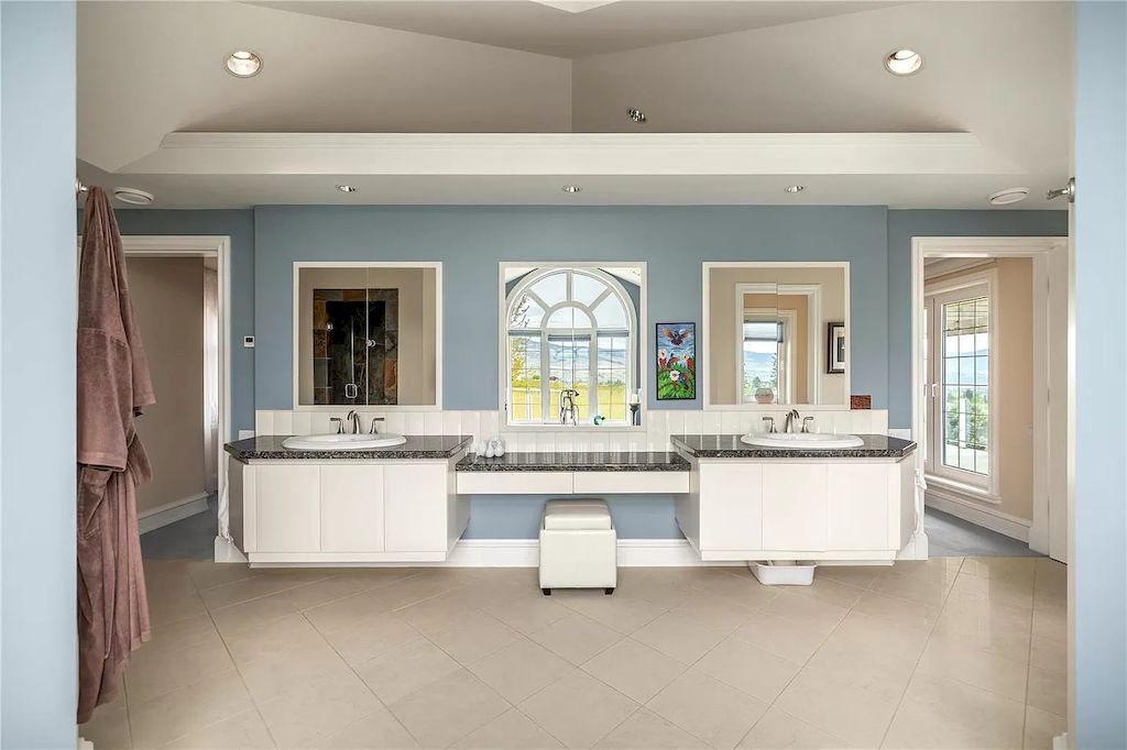 The Charming Italian Style Villa in Kelowna is a private country estate now available for sale. This home is located at 3240 Pooley Rd, Kelowna, BC V1W 4G7, Canada