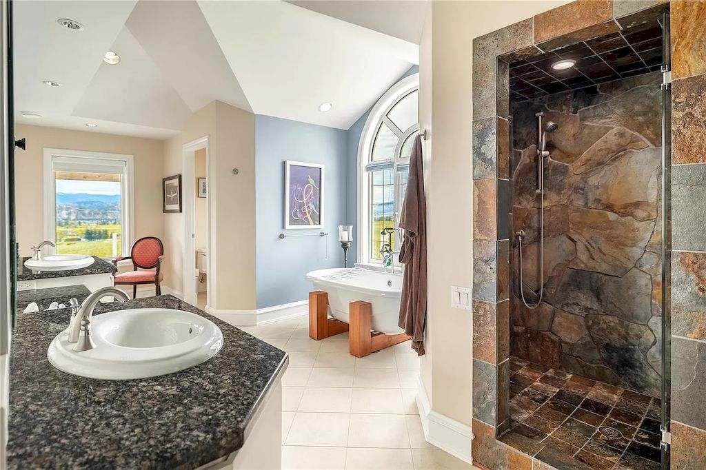 The Charming Italian Style Villa in Kelowna is a private country estate now available for sale. This home is located at 3240 Pooley Rd, Kelowna, BC V1W 4G7, Canada