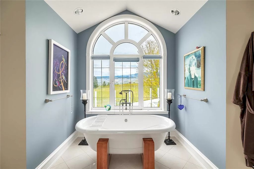 The Charming Italian Style Villa in Kelowna is a private country estate now available for sale. This home is located at 3240 Pooley Rd, Kelowna, BC V1W 4G7, Canada