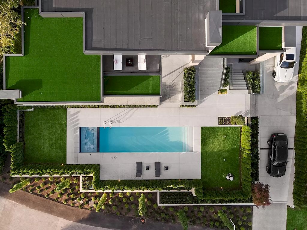 The Modern Estate in West Vancouver features beautiful ocecan views  now available for sale. This home is located at 1225 Renton Rd, West Vancouver, BC V7S 2L1, Canada