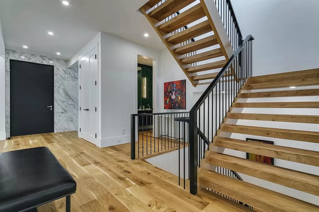 The Calgary Estate is a stunning contemporary masterpiece now available for sale. This home is located at 942 SW Crescent Rd NW, Calgary, AB T2M 4A8, Canada