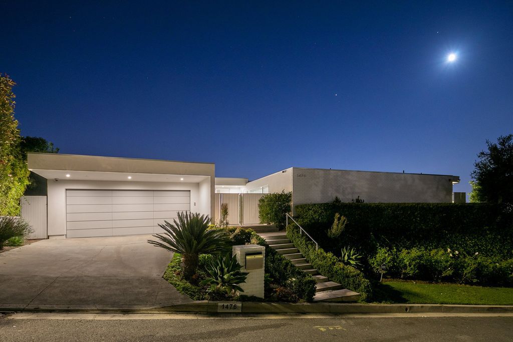 The Home in Beverly Hills is a totally remodeled and updated contemporary estate with head on city to ocean views now available for sale. This home located at 1476 Carla Rdg, Beverly Hills, California