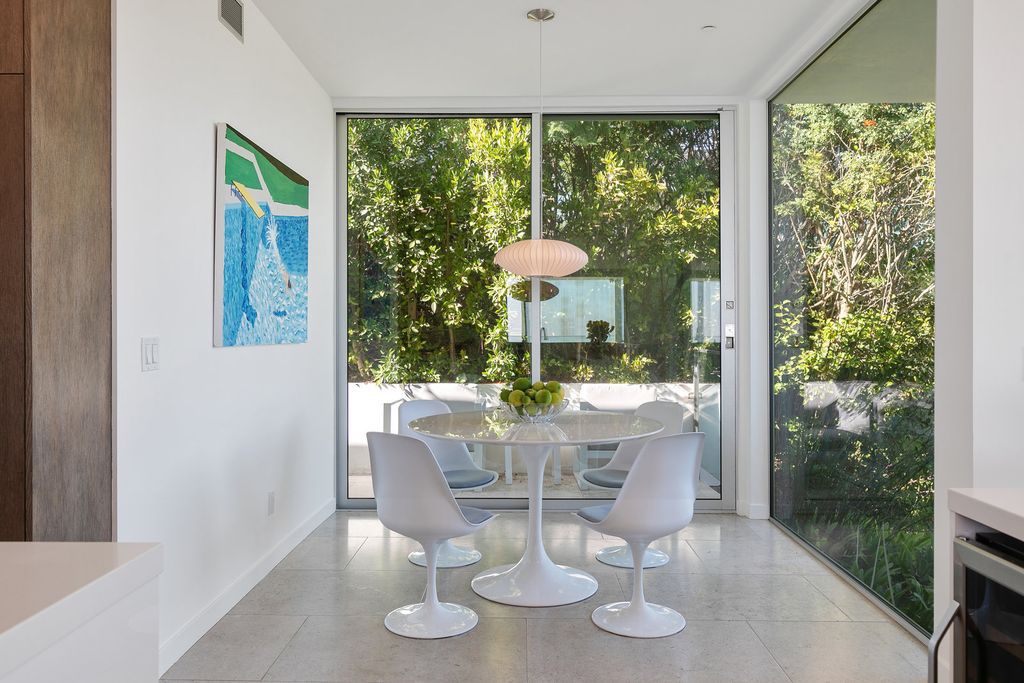The Home in Beverly Hills is a totally remodeled and updated contemporary estate with head on city to ocean views now available for sale. This home located at 1476 Carla Rdg, Beverly Hills, California