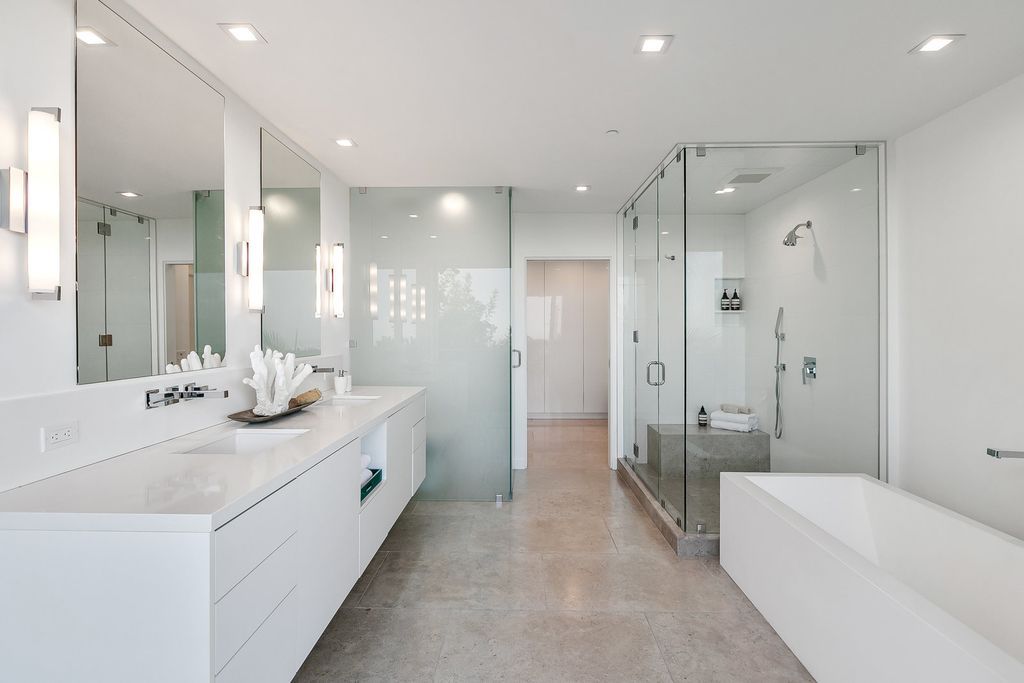 The Home in Beverly Hills is a totally remodeled and updated contemporary estate with head on city to ocean views now available for sale. This home located at 1476 Carla Rdg, Beverly Hills, California