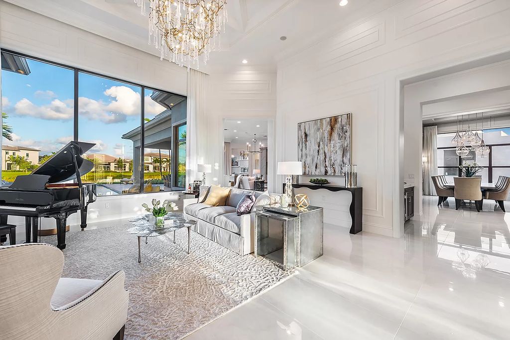 The Home in Boca Raton is a stunning transitional one story estate has Amazing custom pool with spill over spa and natural stone decking now available for sale. This home located at 17236 Brulee Breeze Way, Boca Raton, Florida