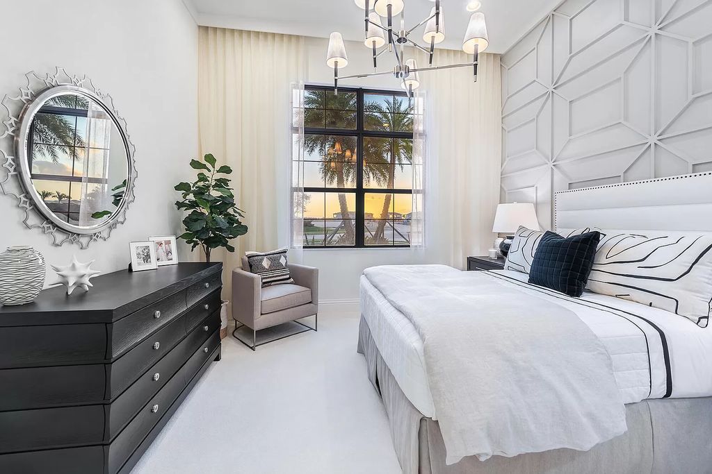 The Home in Boca Raton is a stunning transitional one story estate has Amazing custom pool with spill over spa and natural stone decking now available for sale. This home located at 17236 Brulee Breeze Way, Boca Raton, Florida