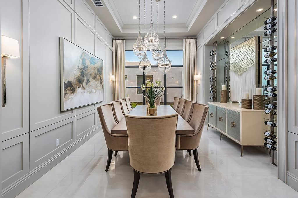 The Home in Boca Raton is a stunning transitional one story estate has Amazing custom pool with spill over spa and natural stone decking now available for sale. This home located at 17236 Brulee Breeze Way, Boca Raton, Florida