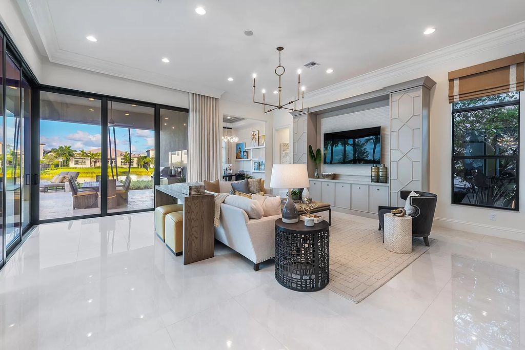 The Home in Boca Raton is a stunning transitional one story estate has Amazing custom pool with spill over spa and natural stone decking now available for sale. This home located at 17236 Brulee Breeze Way, Boca Raton, Florida