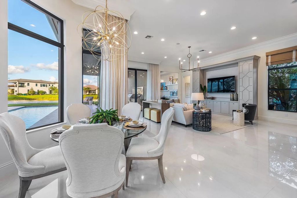 The Home in Boca Raton is a stunning transitional one story estate has Amazing custom pool with spill over spa and natural stone decking now available for sale. This home located at 17236 Brulee Breeze Way, Boca Raton, Florida