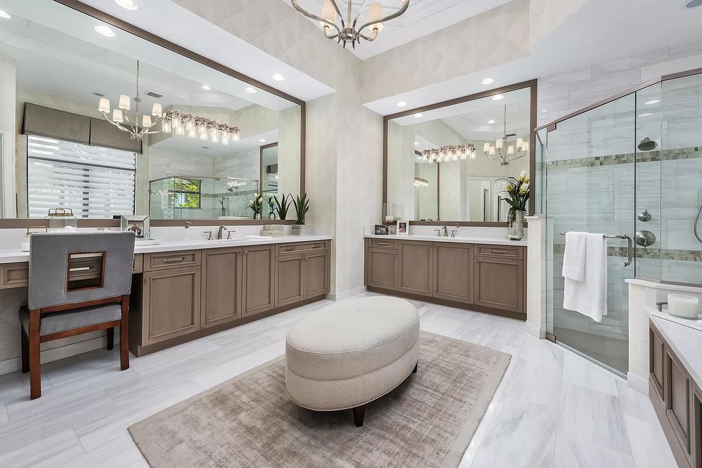 The Home in Boca Raton is a stunning transitional one story estate has Amazing custom pool with spill over spa and natural stone decking now available for sale. This home located at 17236 Brulee Breeze Way, Boca Raton, Florida