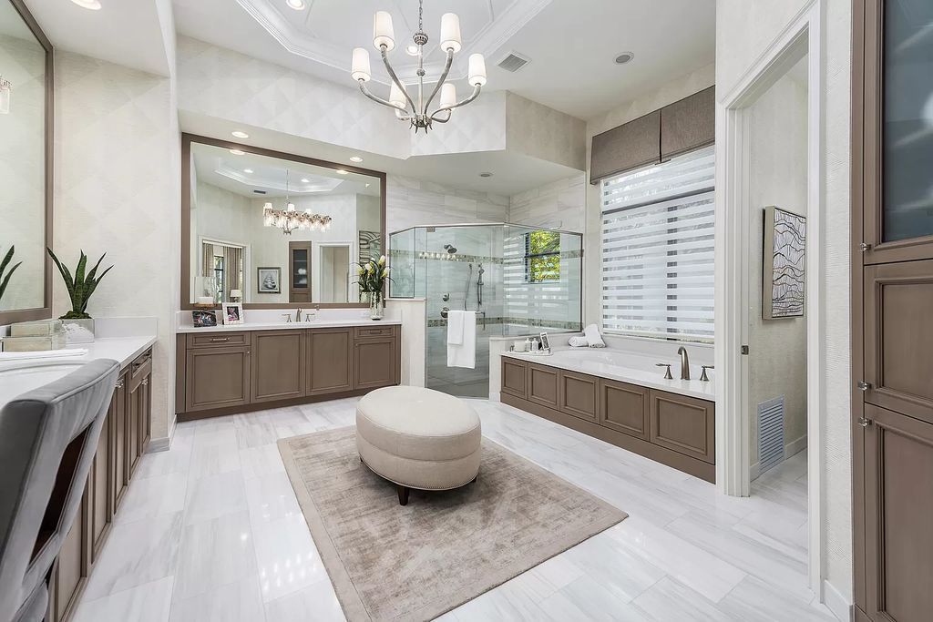 The Home in Boca Raton is a stunning transitional one story estate has Amazing custom pool with spill over spa and natural stone decking now available for sale. This home located at 17236 Brulee Breeze Way, Boca Raton, Florida