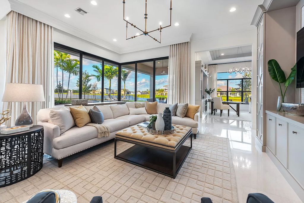 The Home in Boca Raton is a stunning transitional one story estate has Amazing custom pool with spill over spa and natural stone decking now available for sale. This home located at 17236 Brulee Breeze Way, Boca Raton, Florida