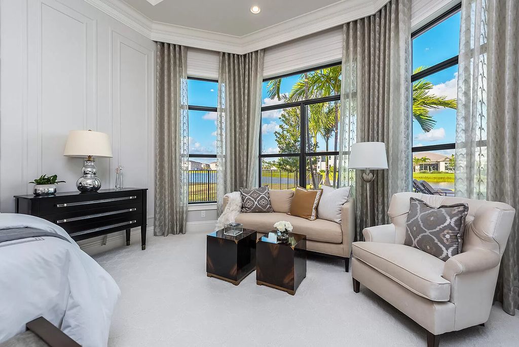 The Home in Boca Raton is a stunning transitional one story estate has Amazing custom pool with spill over spa and natural stone decking now available for sale. This home located at 17236 Brulee Breeze Way, Boca Raton, Florida