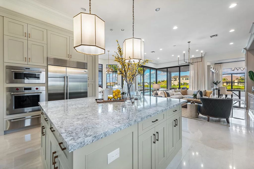 The Home in Boca Raton is a stunning transitional one story estate has Amazing custom pool with spill over spa and natural stone decking now available for sale. This home located at 17236 Brulee Breeze Way, Boca Raton, Florida