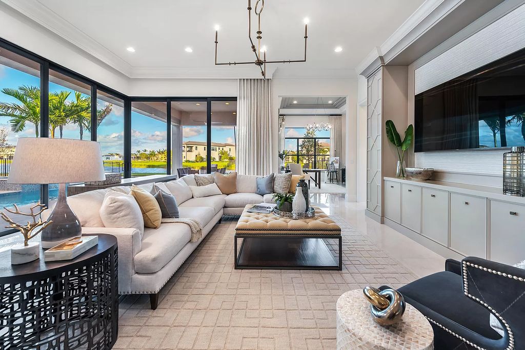 The Home in Boca Raton is a stunning transitional one story estate has Amazing custom pool with spill over spa and natural stone decking now available for sale. This home located at 17236 Brulee Breeze Way, Boca Raton, Florida
