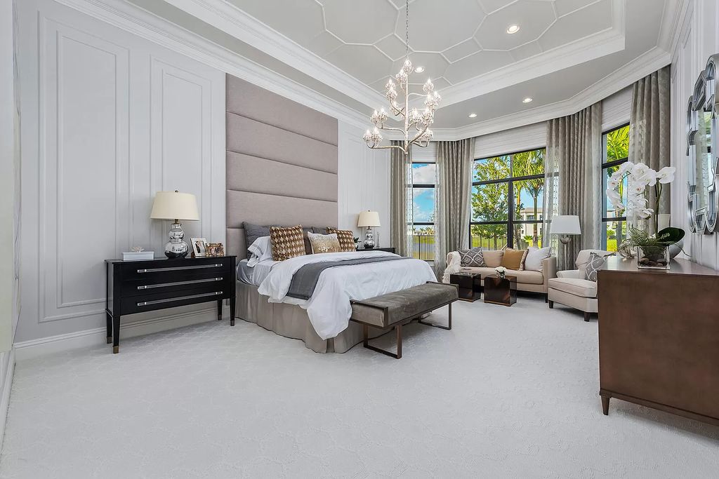 The Home in Boca Raton is a stunning transitional one story estate has Amazing custom pool with spill over spa and natural stone decking now available for sale. This home located at 17236 Brulee Breeze Way, Boca Raton, Florida