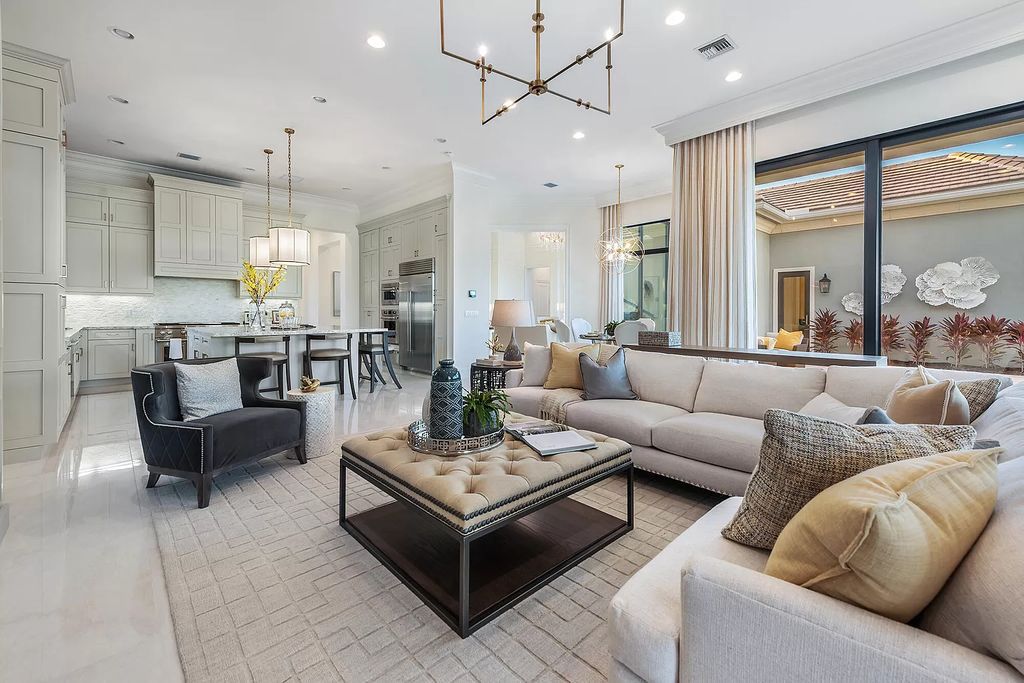 The Home in Boca Raton is a stunning transitional one story estate has Amazing custom pool with spill over spa and natural stone decking now available for sale. This home located at 17236 Brulee Breeze Way, Boca Raton, Florida