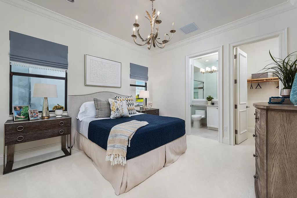 The Home in Boca Raton is a stunning transitional one story estate has Amazing custom pool with spill over spa and natural stone decking now available for sale. This home located at 17236 Brulee Breeze Way, Boca Raton, Florida