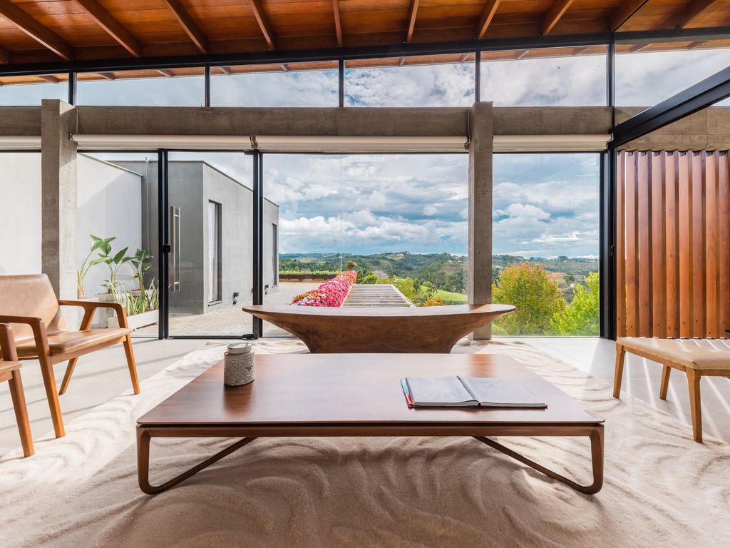 TKN House a Stunning Mountain Home on Steep Site by OTP Arquitetura 11