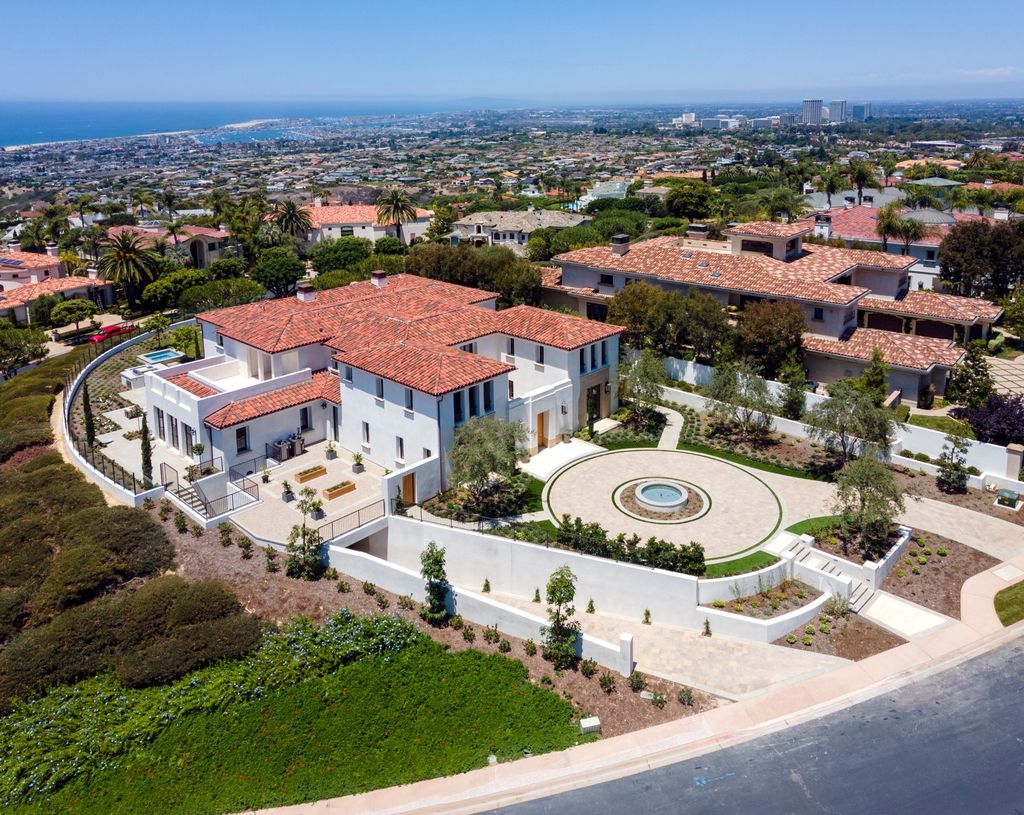 The Newport Coast Mansion is a new construction estate located within Newport Coast’s prized Pelican Hill gated community now available for sale. This home located at 7 Harbor Lgt, Newport Coast, California