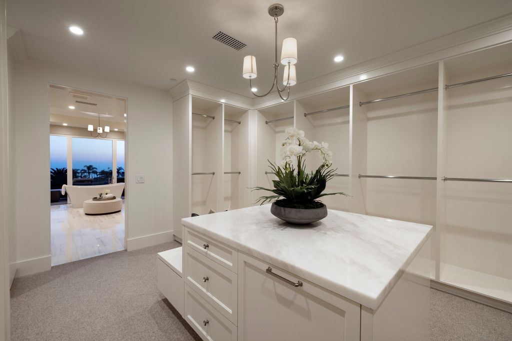 The Newport Coast Mansion is a new construction estate located within Newport Coast’s prized Pelican Hill gated community now available for sale. This home located at 7 Harbor Lgt, Newport Coast, California
