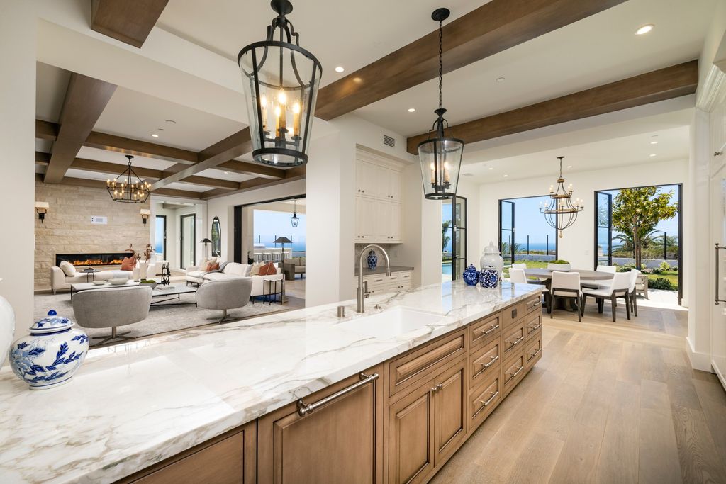 The Newport Coast Mansion is a new construction estate located within Newport Coast’s prized Pelican Hill gated community now available for sale. This home located at 7 Harbor Lgt, Newport Coast, California
