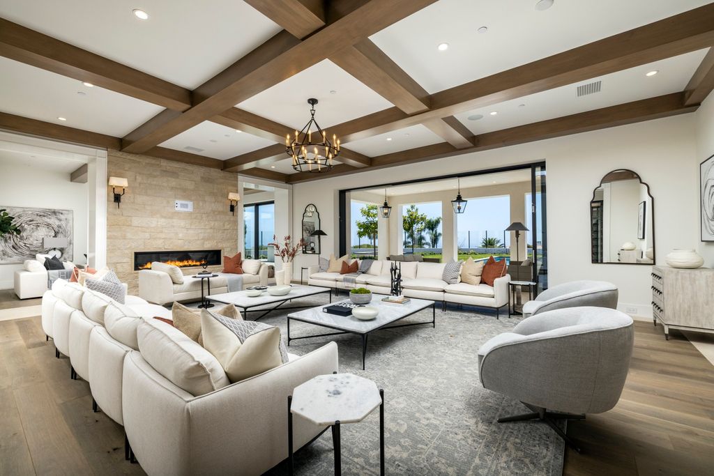The Newport Coast Mansion is a new construction estate located within Newport Coast’s prized Pelican Hill gated community now available for sale. This home located at 7 Harbor Lgt, Newport Coast, California