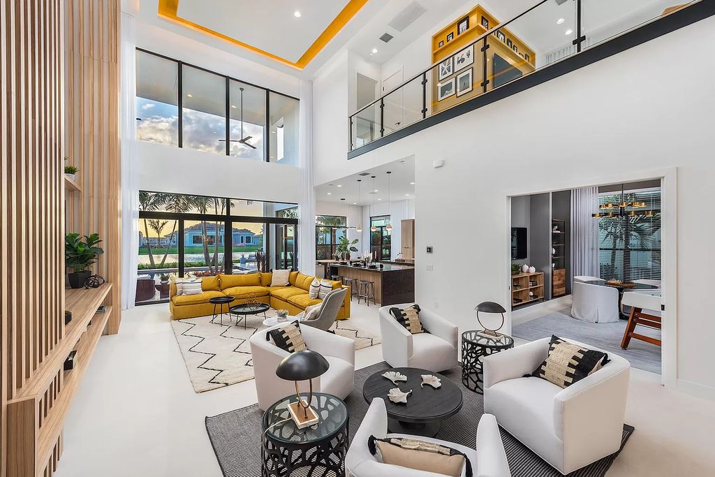The Boca Raton Home offers a contemporary Geometric Pool with Negative Edge spa and gorgeous upgraded polished Travertine deck overlooking the lake now available for sale. This home located at 17161 Ludovica Ln, Boca Raton, Florida