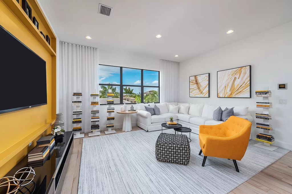 The Boca Raton Home offers a contemporary Geometric Pool with Negative Edge spa and gorgeous upgraded polished Travertine deck overlooking the lake now available for sale. This home located at 17161 Ludovica Ln, Boca Raton, Florida