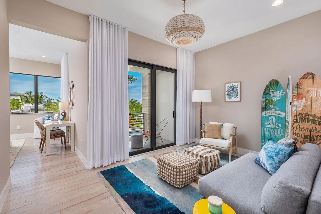 The Boca Raton Home offers a contemporary Geometric Pool with Negative Edge spa and gorgeous upgraded polished Travertine deck overlooking the lake now available for sale. This home located at 17161 Ludovica Ln, Boca Raton, Florida